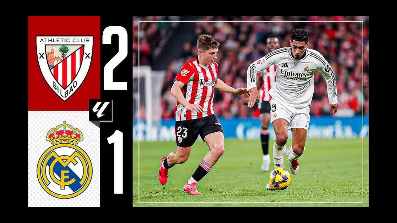 Cầu thủ của Athletic Bilbao đang nỗ lực chống lại áp lực từ cầu thủ của Real Madrid. Cầu thủ của Athletic Bilbao đang nỗ lực chống lại áp lực từ cầu thủ của Real Madrid.